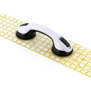 Ruler Grip Suction Cup enhancing control and accuracy in sewing projects
