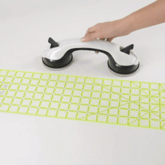 Handy Ruler Grip Suction Cup ensuring precise fabric cutting