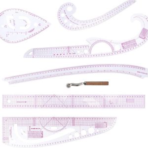 Sewer holding a French Curve Metric Ruler Template over fabric for easy clothing adjustments