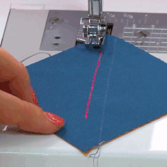 User easily attaching Quilting Laser Guide to enhance free-motion quilting