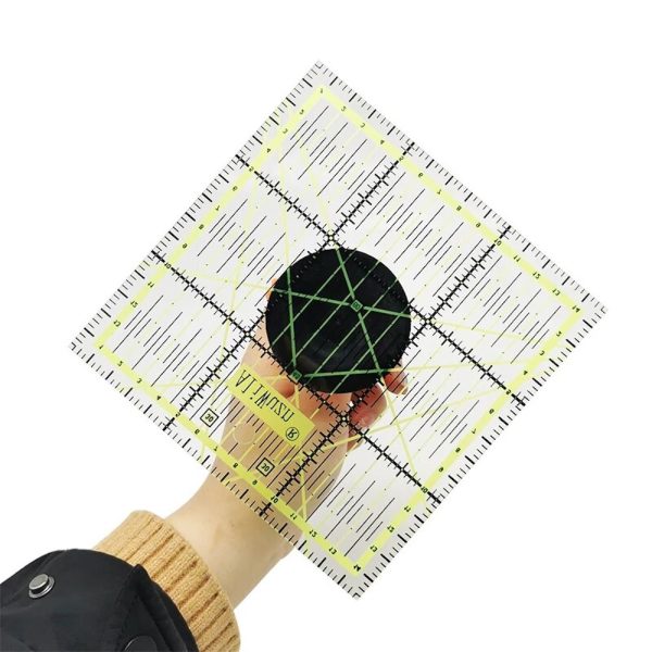User-friendly Ruler Handle Suction Cup attached to a quilting ruler
